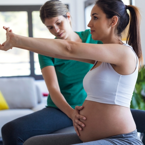pregnant woman doing pelvic floor therapy exercises